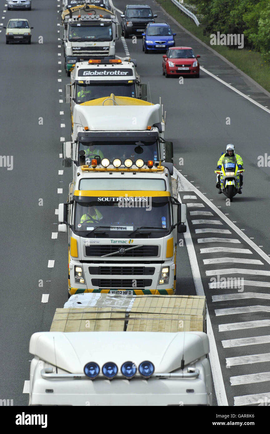 Lorry drivers in a roadblock protest on fuel price increases on the M4 in Bridgend, Wales. Stock Photo
