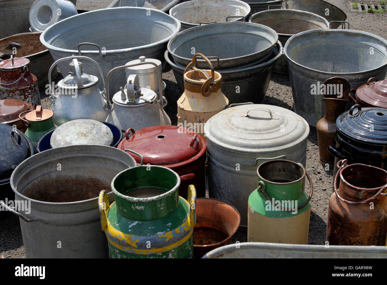 Collection of old flea market churns Stock Photo