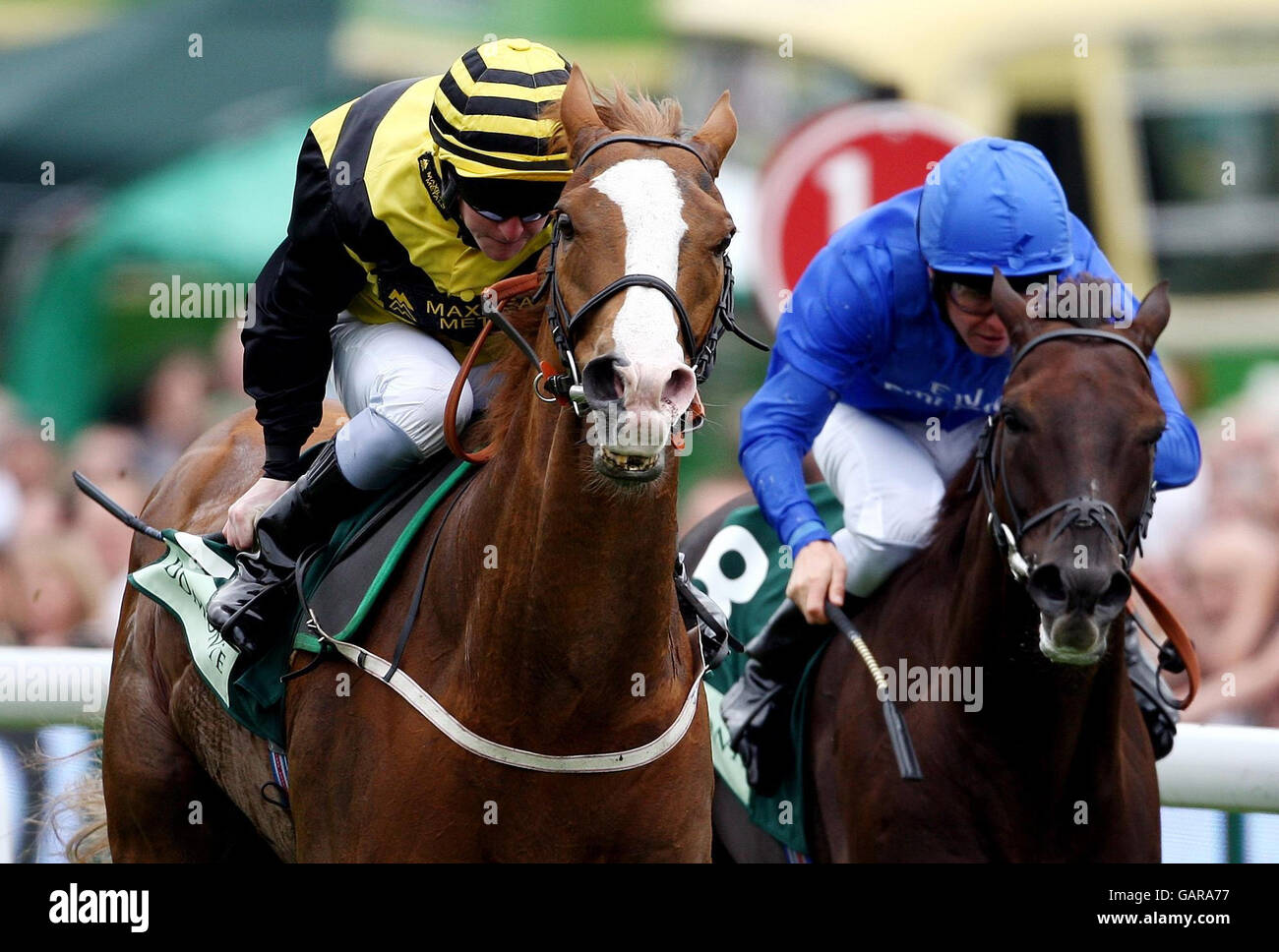 Horse Racing - The 2008 Derby Festival - Ladies Day - Epsom Downs Racecourse. Blythe Knight and jockey Graham Gibbons (Yellow & Black colours) wins the Juddmonte Diomed Stakes at Epsom Downs Racecourse, Surrey. Stock Photo
