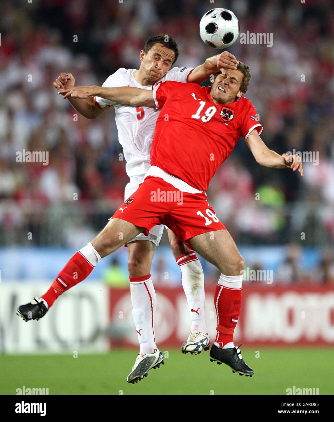 Austria's Jurgen Saumel (r) and Poland's Dariusz Dudka battle for the ball Stock Photo