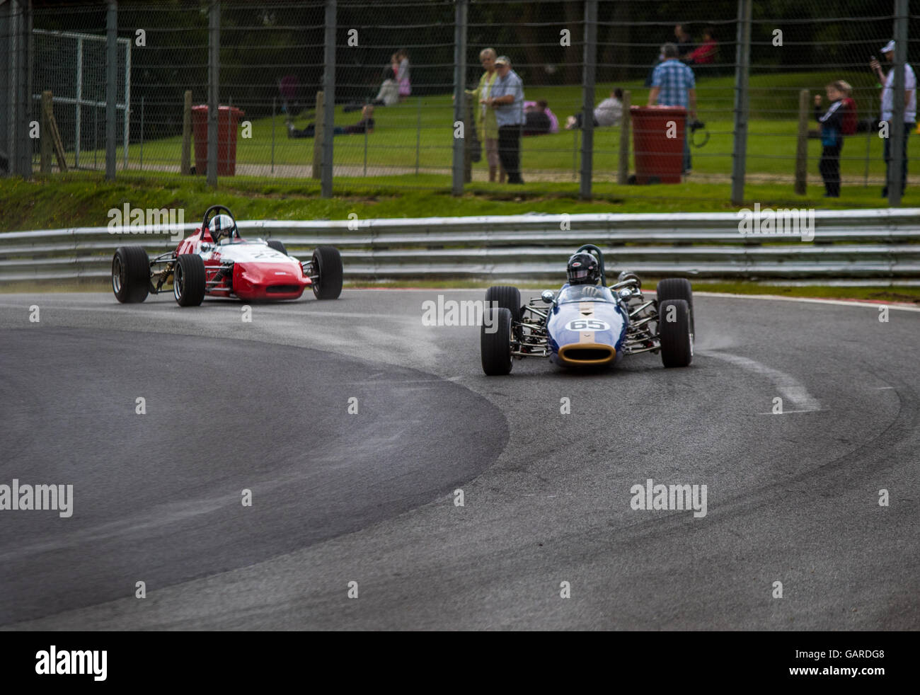 Historic Formula 3 cars round Druids bend at Brands Hatch, Legends of Brands Hatch Superprix meeting Stock Photo