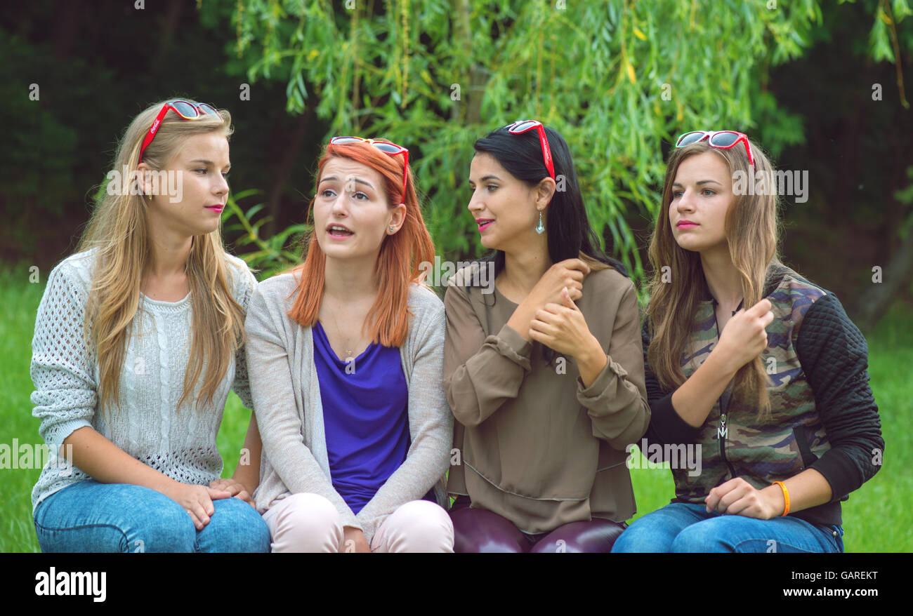 Happy friends posing together on a summer day Stock Photo - Alamy