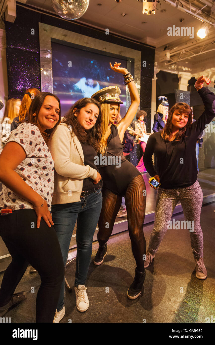 England, London, Madame Tussauds, Tourists Posing with Wax Figure of Beyonce Stock Photo