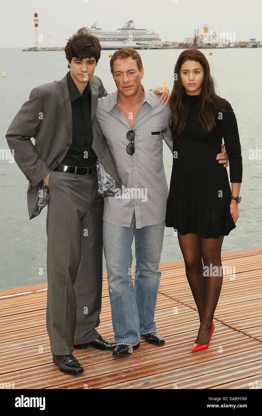 61st Cannes Film Festival - Van Damme Photocall. AP OUT Jean Claude Van Damme and family is seen at a photocall on the Majestic Pier in Cannes, France. Stock Photo