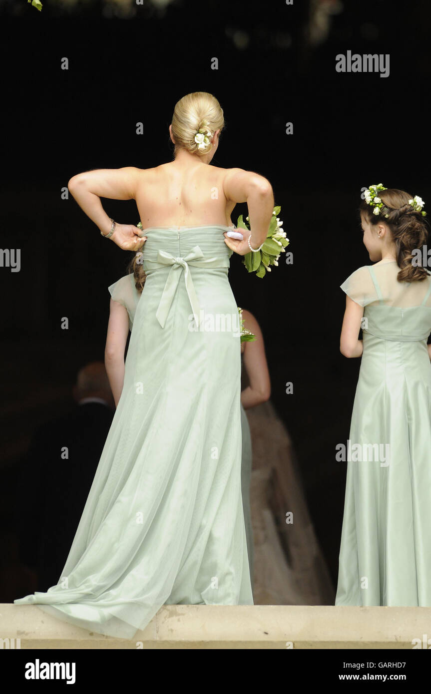 Zara Phillips (left) arrives for the wedding of her brother Peter to Autumn Kelly at St George's Chapel, Windsor at the St George's Chapel, Windsor. Stock Photo