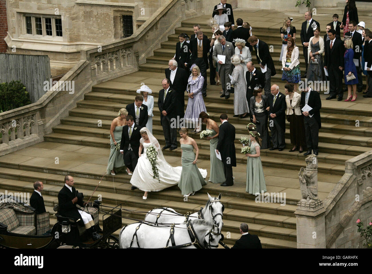 Peter Phillips, the eldest grandson of Queen Elizabeth II and Canadian Autumn Kelly leave St. George's Chapel in Windsor, England, after their marriage ceremony. Stock Photo