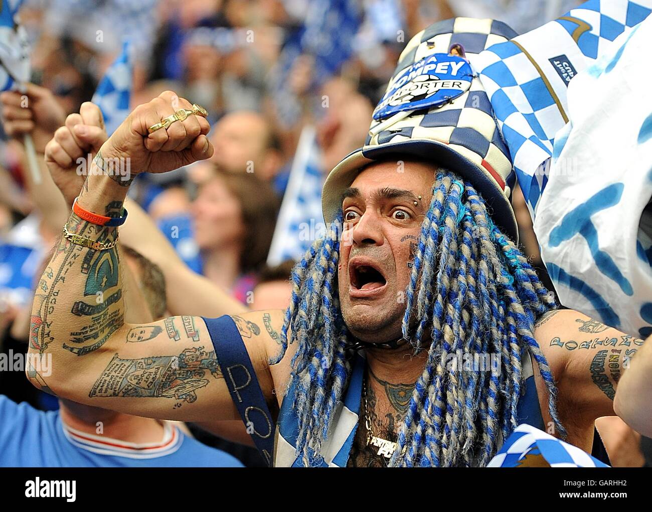 Portsmouth fan John 'Portsmouth Football Club' Westwood is visibly