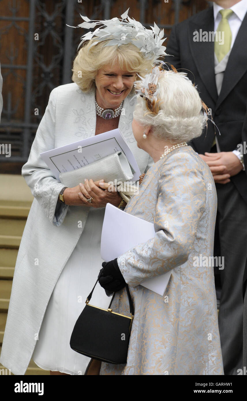 Queen Elizabeth II and the Duchess of Cornwall outside St. George's Chapel in Windsor after the wedding of Peter Phillips and Autumn Kelly Stock Photo