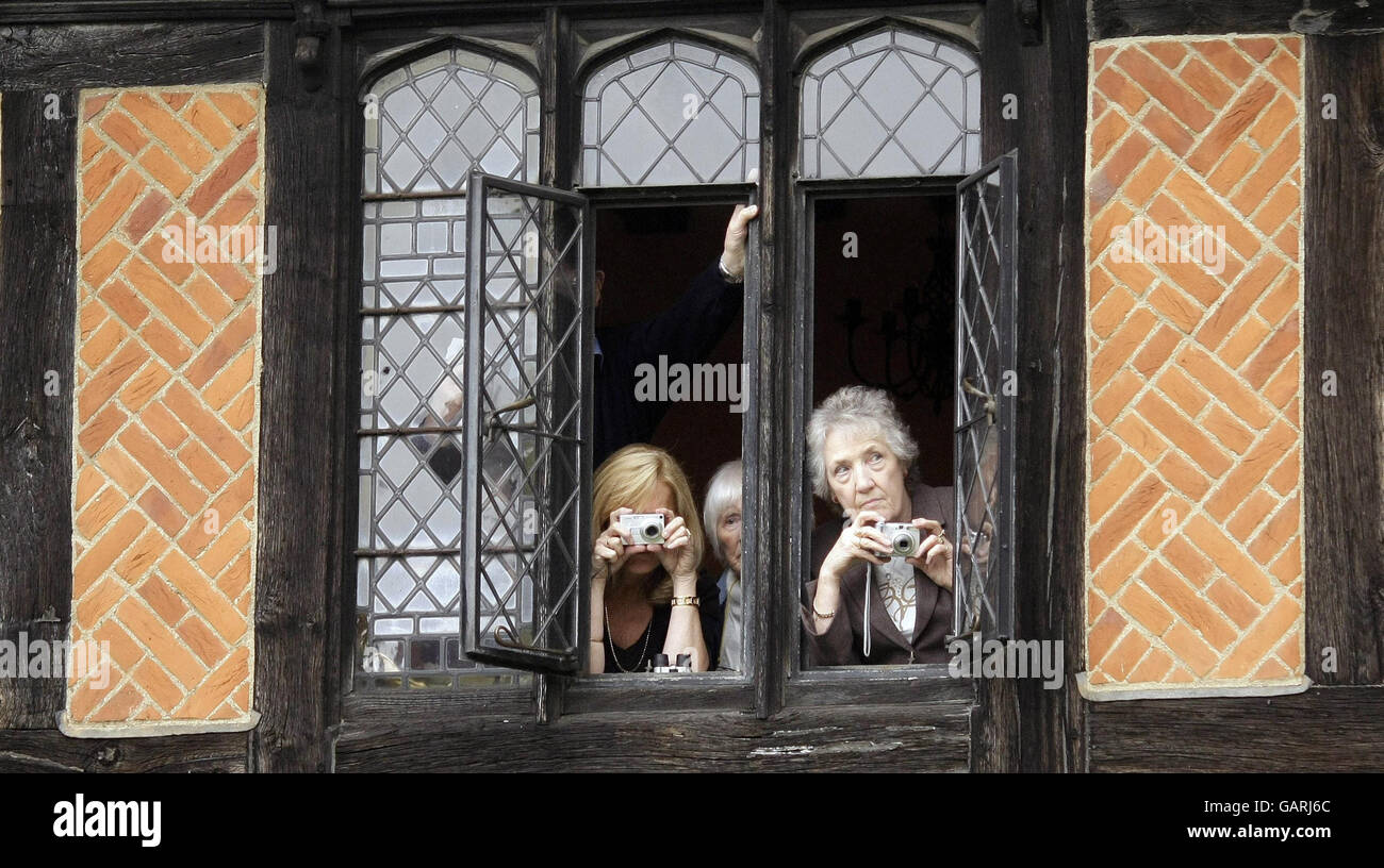 Members of the Windsor Castle royal household watch the wedding ceremony of Peter Phillips and Autumn Kelly held in St George's Chapel inside the grounds of Windsor Castle. Stock Photo