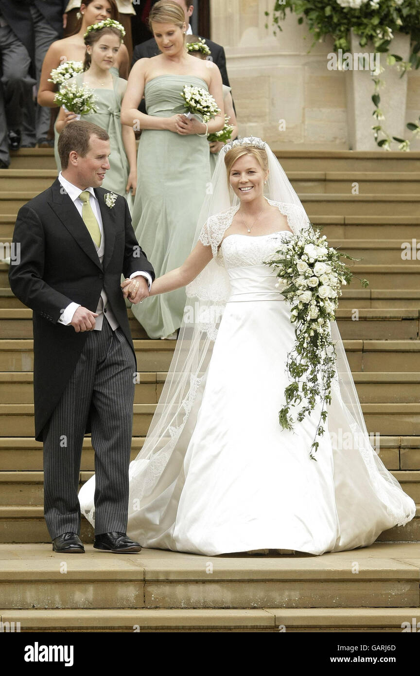 Peter Phillips, the eldest grandson of Queen Elizabeth II and Canadian Autumn Kelly leave St. George's Chapel in Windsor, England, after their marriage ceremony. Stock Photo