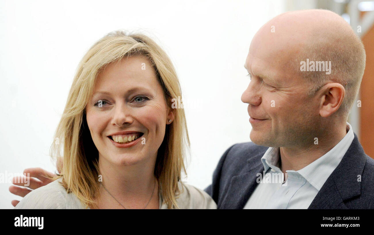 Shadow Foreign Secretary William Hague supports his wife, Ffion Hague before she speaks about her book 'The Pain and the Privilege' at the Guardian Hay Festival. Stock Photo