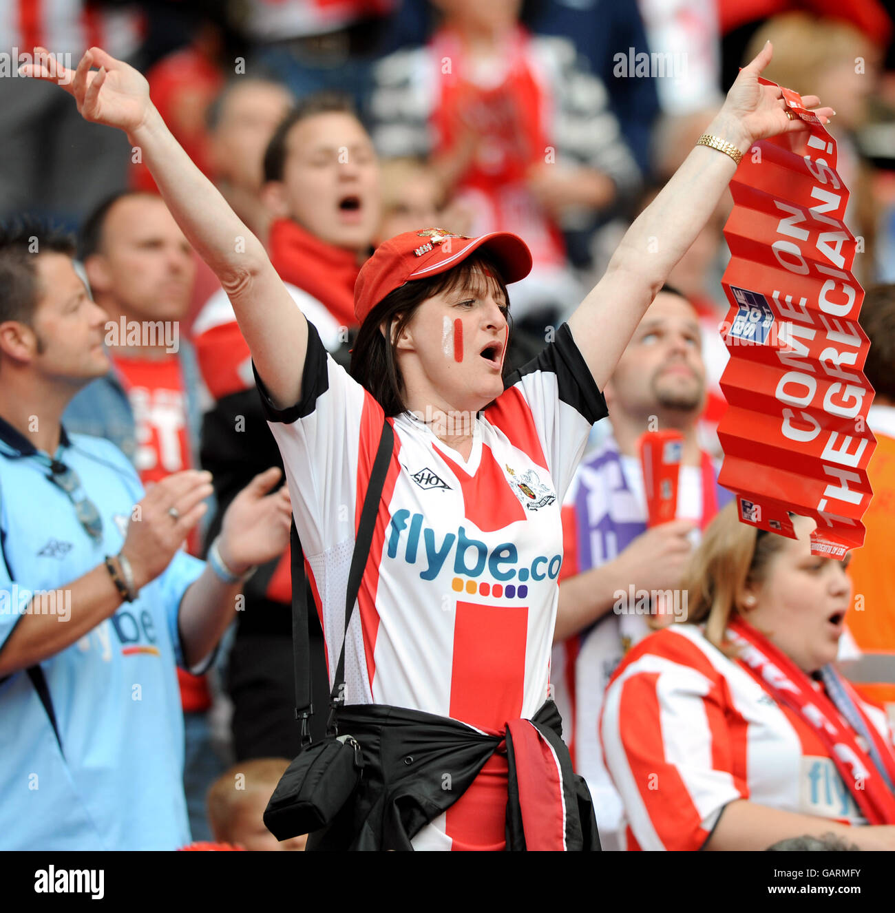 exeter-city-fans-in-the-stands-high-resolution-stock-photography-and