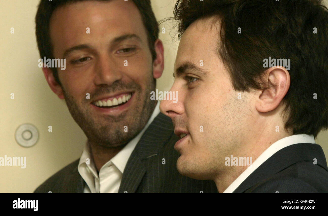Director Ben Affleck (left) pictured with brother and star of the film Casey Affleck during a photocall for 'Gone Baby Gone', at the Mandarin Oriental hotel in west London. Stock Photo