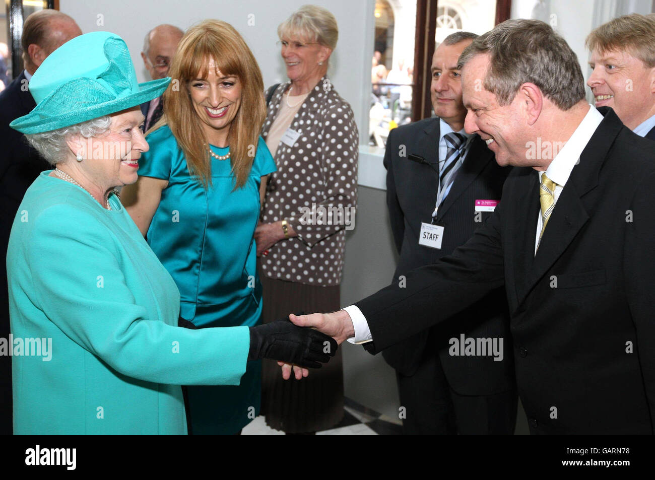 Britain's Queen Elizabeth II meets Mike Rann, Premier of South Australia, during a visit to the Royal Institution of Great Britain, London. Stock Photo
