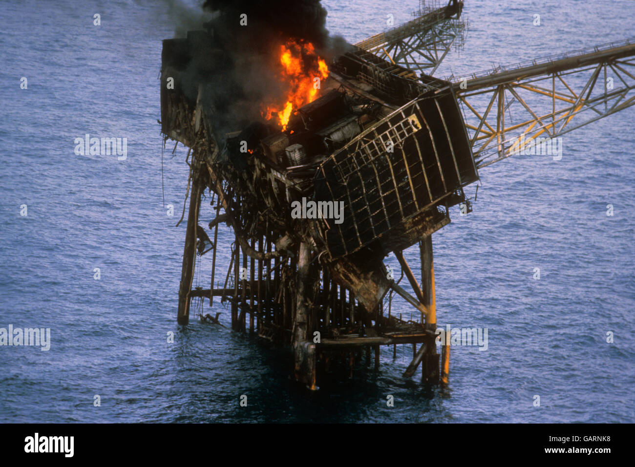 The wreckage of the Piper Alpha oil production platform that exploded yesterday killing dozens of workers on board. Stock Photo