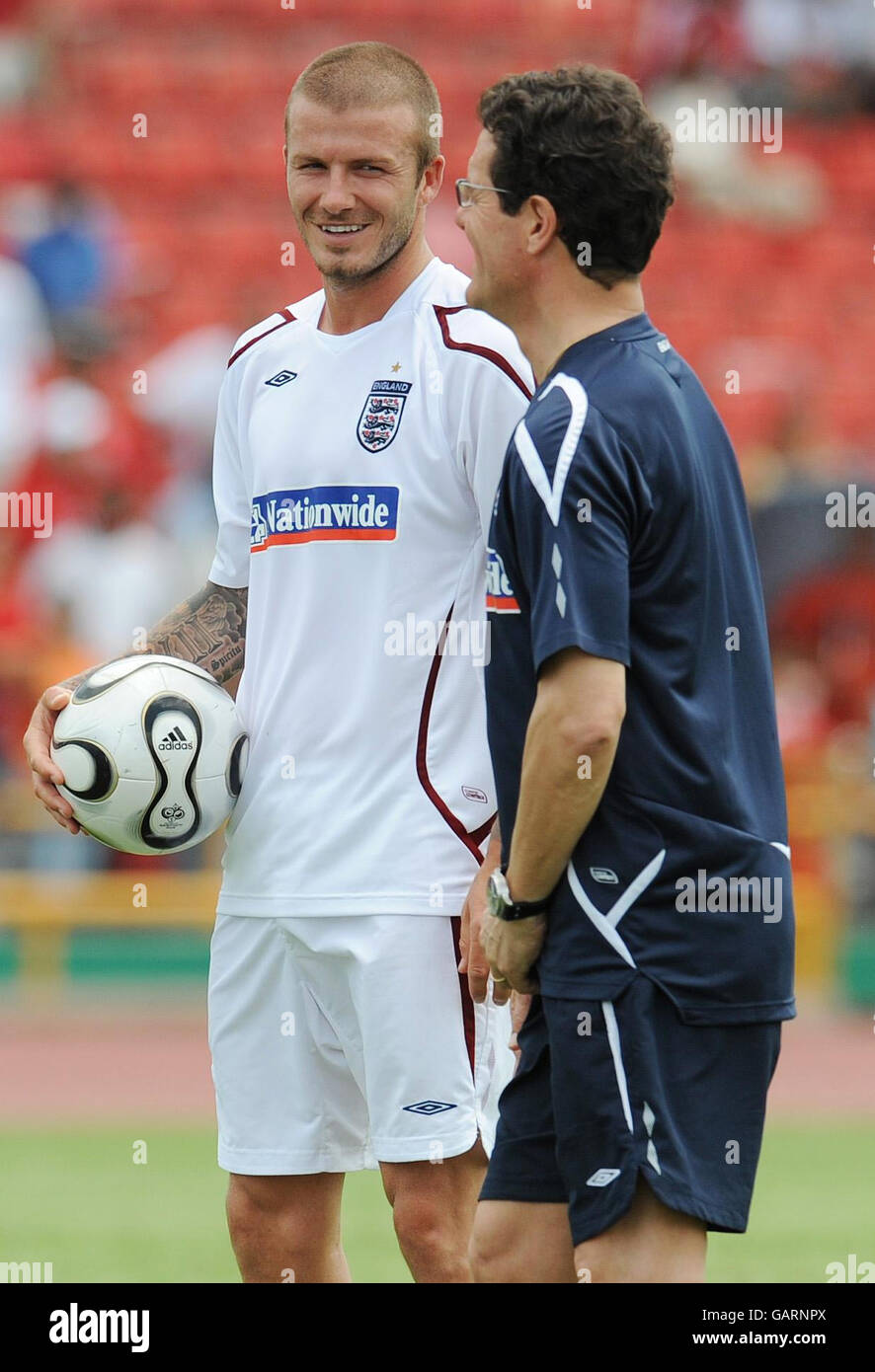England's David Beckham (left) and manager Fabio Capello during a training  session at Hasely Crawford Stadium, Port of Spain, Trinidad Stock Photo -  Alamy
