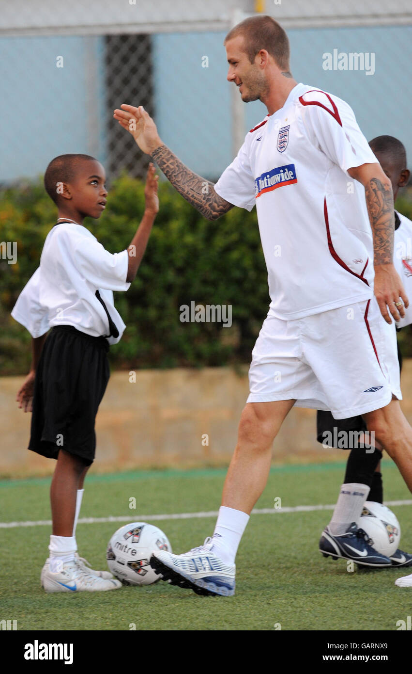 Soccer - England Soccer Clinic Marvin Stadium. England's David during a soccer clinic for local school children at the Marvin Lee Stadium, of Spain, Trinidad Stock Photo - Alamy