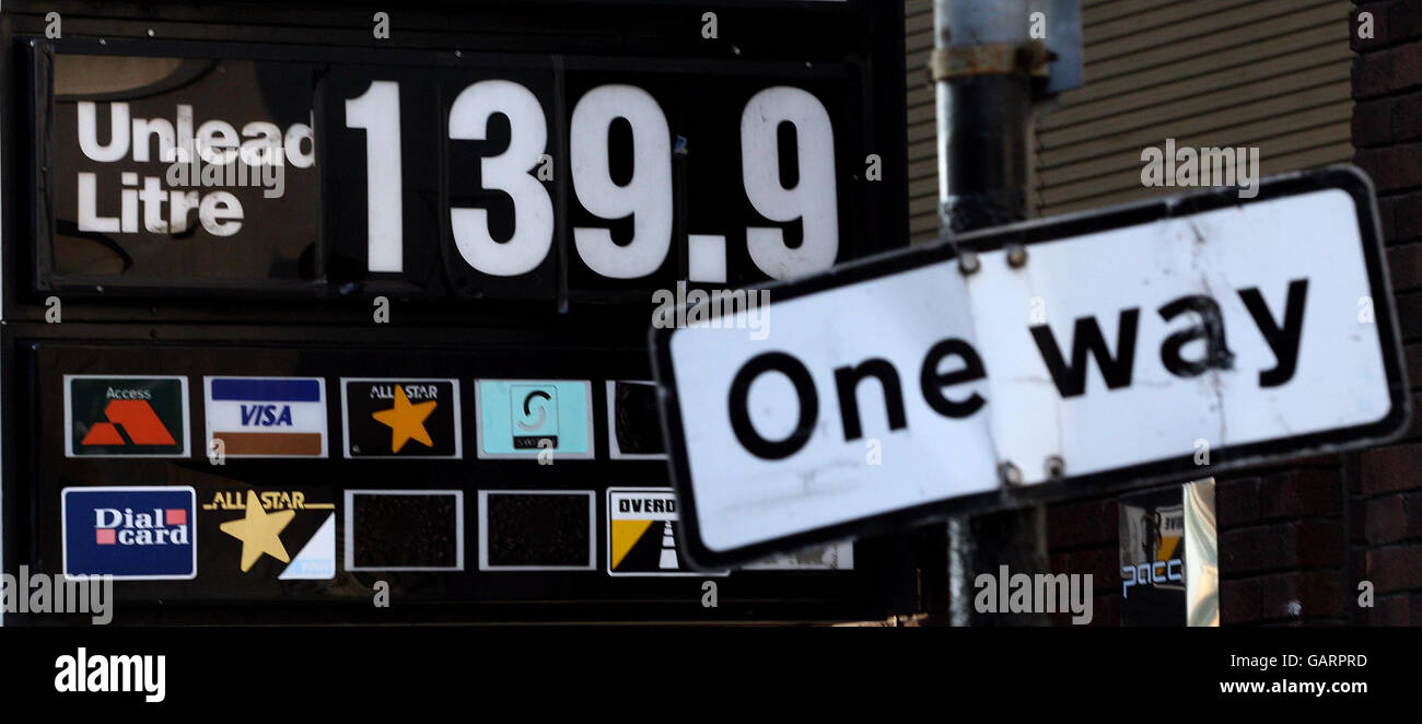 A sign advertises unleaded petrol for 139.9 pence per litre at the Eco filling station on Holland Road in Kensington, London. Stock Photo