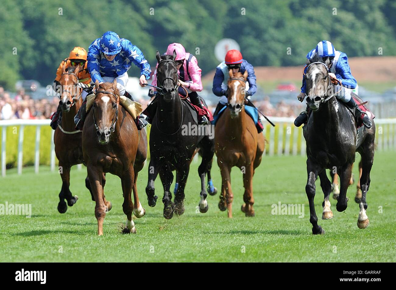 Action from the Rectangle Group Sandy Lane Stakes at the Timeform Silver Salver at Haydock Park Stock Photo