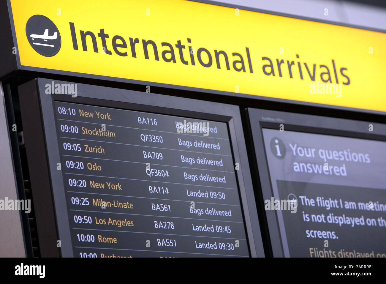 An information screen at Heathrow Airport, British Airways switch some of their long haul flights to Terminal 5. Stock Photo