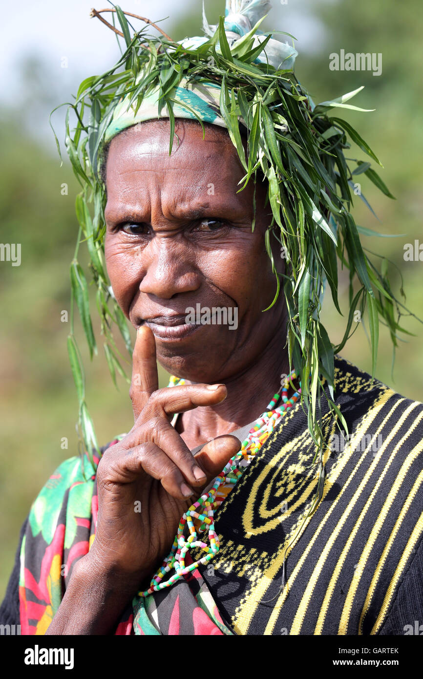 Professional circumciser still practicing female genital mutilation in her traditional circumcision costume. Nakuru, Kenya, Africa Stock Photo