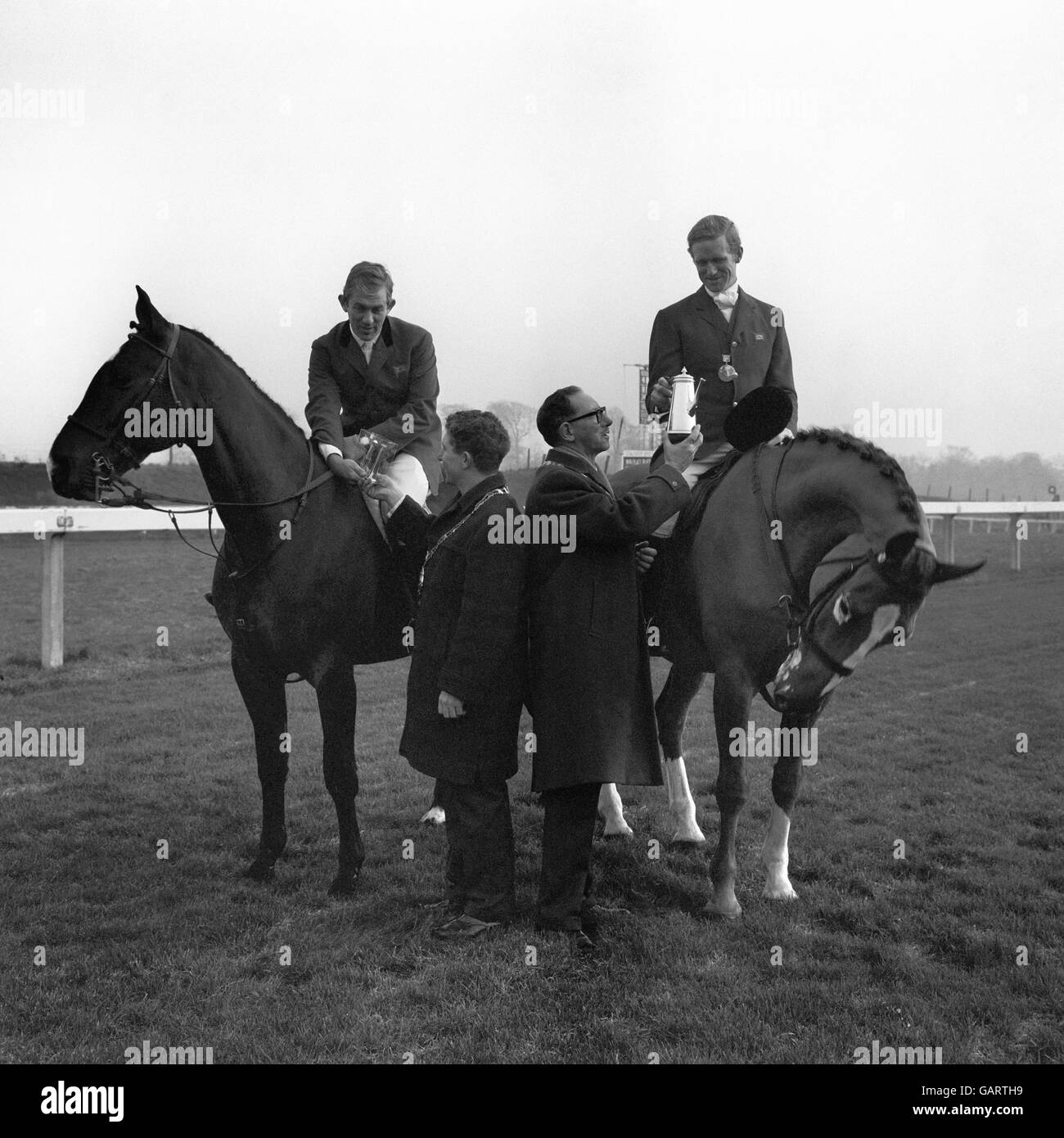 British Olympic medal winners David Broome, left, and Richard Meade, receive presentations from local councillors. Meade won the team gold medal in the three day eventing and Broome the individual bronze in the show jumping. Stock Photo
