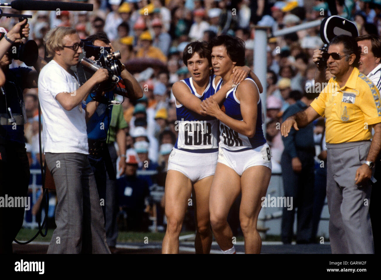 Two of the East German women's 4x400 metres relay team, celebrating