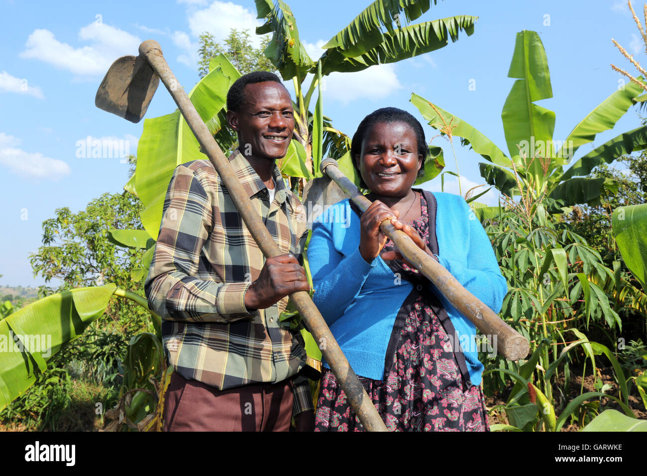 Farmer couple in their banana plantation in Rwanda, Africa Stock Photo