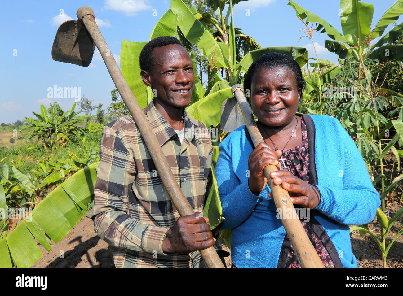 Farmer couple in their banana plantation in Rwanda, Africa Stock Photo