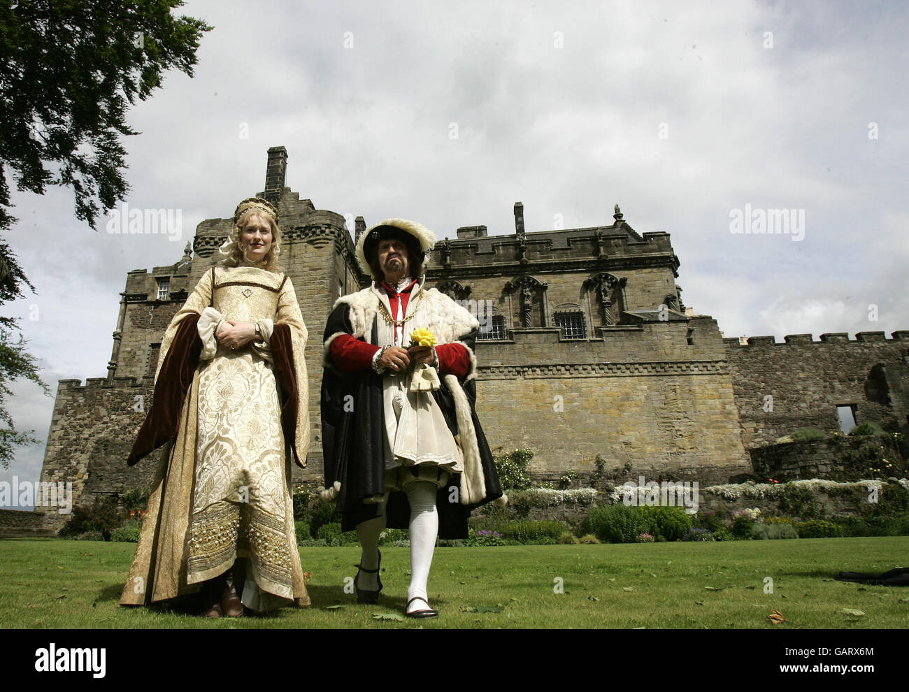 Actors dressed in 16th century costume in Stirling Castle's Queen Anne