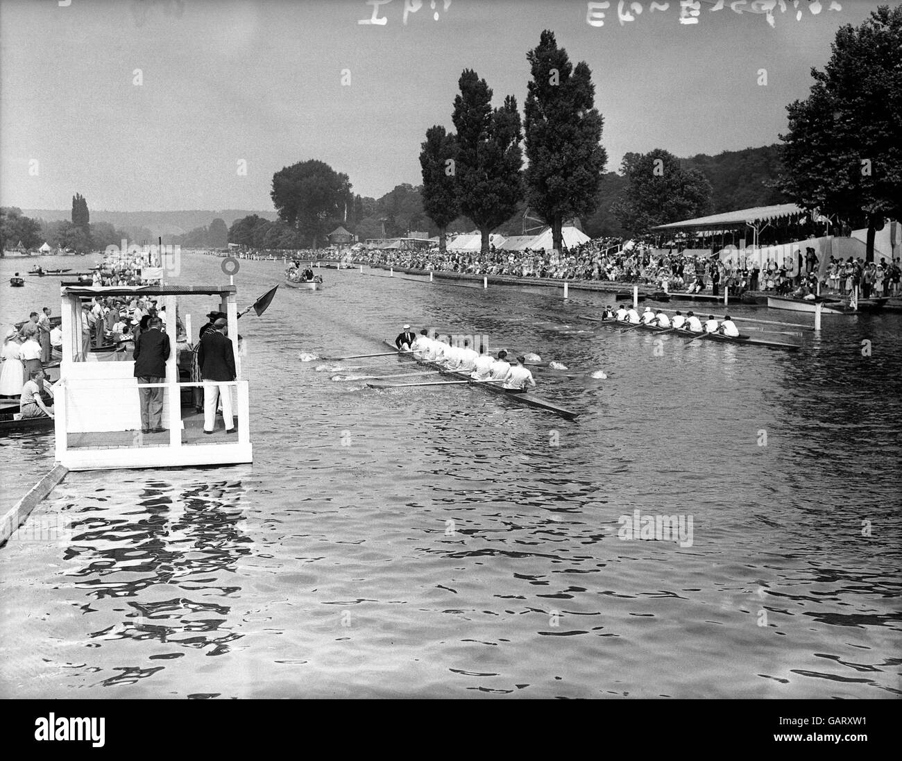 Rowing - Henley Royal Regatta. The Ibis boat beats the Eton Excelsior boat in heat 13 of the Thames Cup for coxed eights Stock Photo