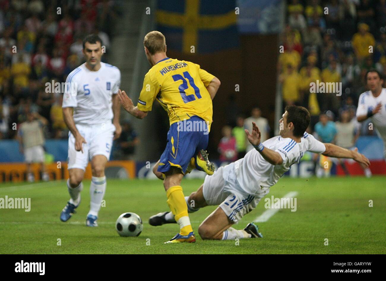Soccer - UEFA European Championship 2008 - Group D - Greece v Sweden - Wals Siezenheim Stadium. Sweden's Christian Wilhelmsson is tackled by Greece's Kostas Katsouranis. Stock Photo