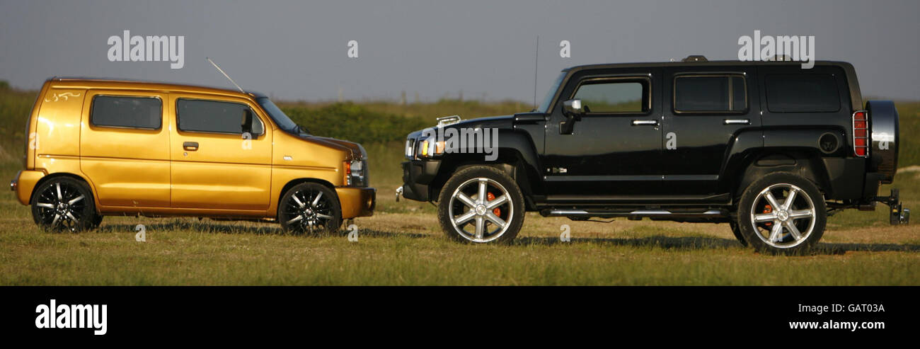A mini Hummer designed and built by Andy Saunders from Poole, Dorset, which he has constructed from a Suzuki Wagon R sits beside a Hummer H3. Stock Photo