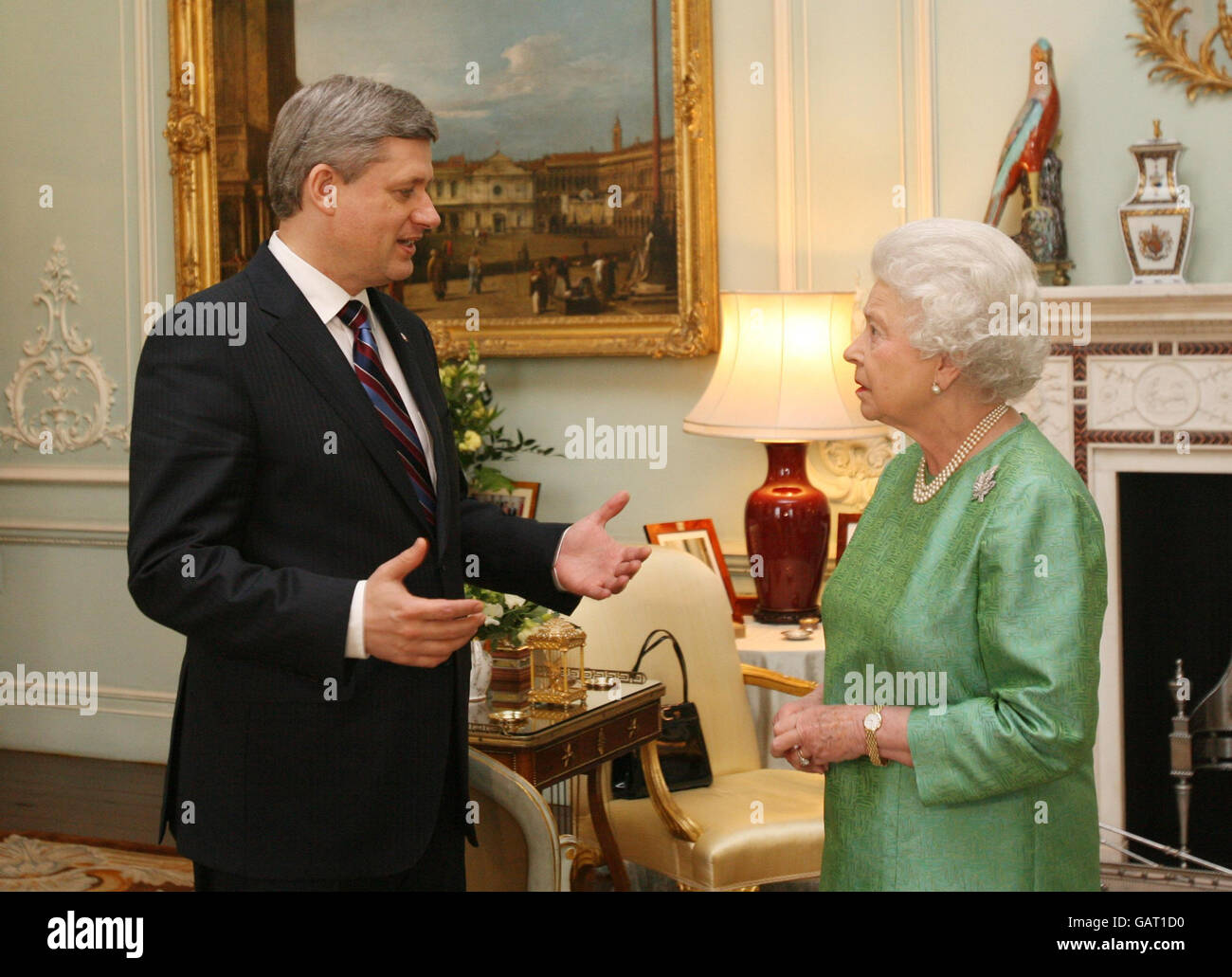 Queen Elizabeth II greets the Canadian Prime Minister Stephen Harper