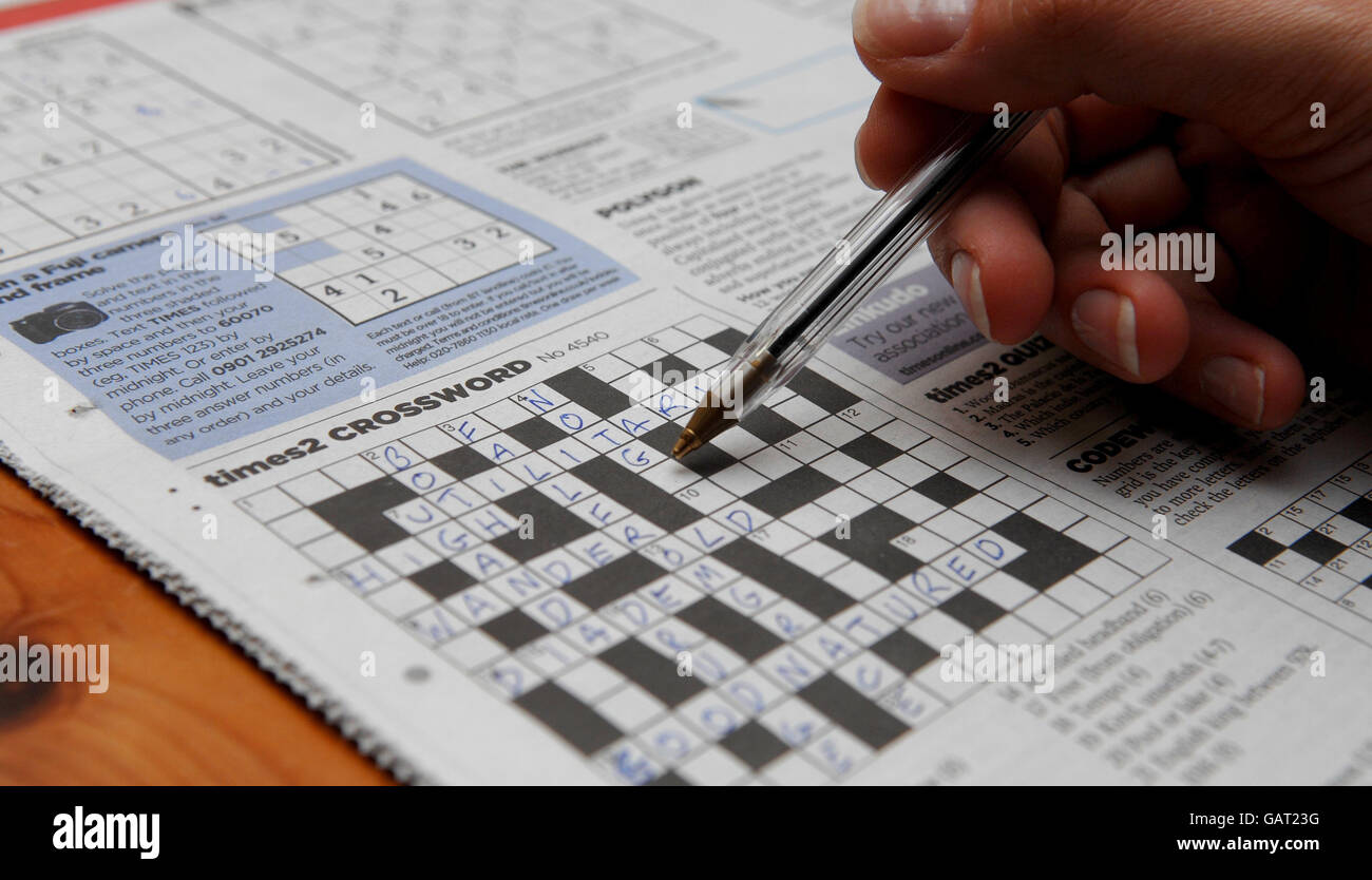 Generic photo of a crossword puzzle being completed with a ball point