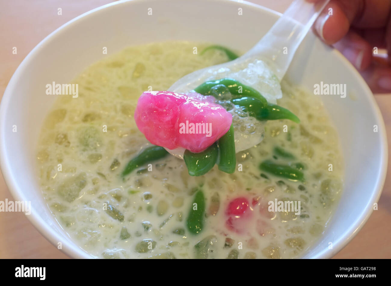 Cendol and stuffed water chestnuts in crushed ice and coconut milk, thai dessert Stock Photo Alamy