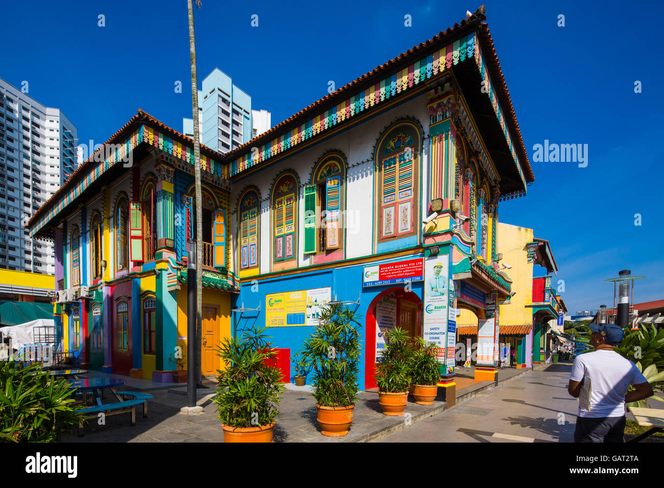 A man in cap is viewing Tan Teng Niah house at Little India, good weather with blue sky. Singapore. Stock Photo