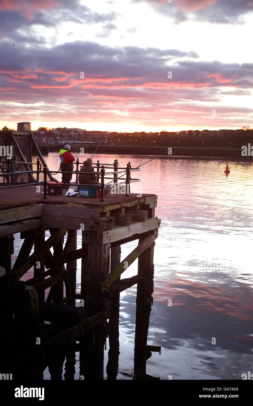 Fishing at sunset, River Tyne, Harton Quays, South Shields Stock Photo