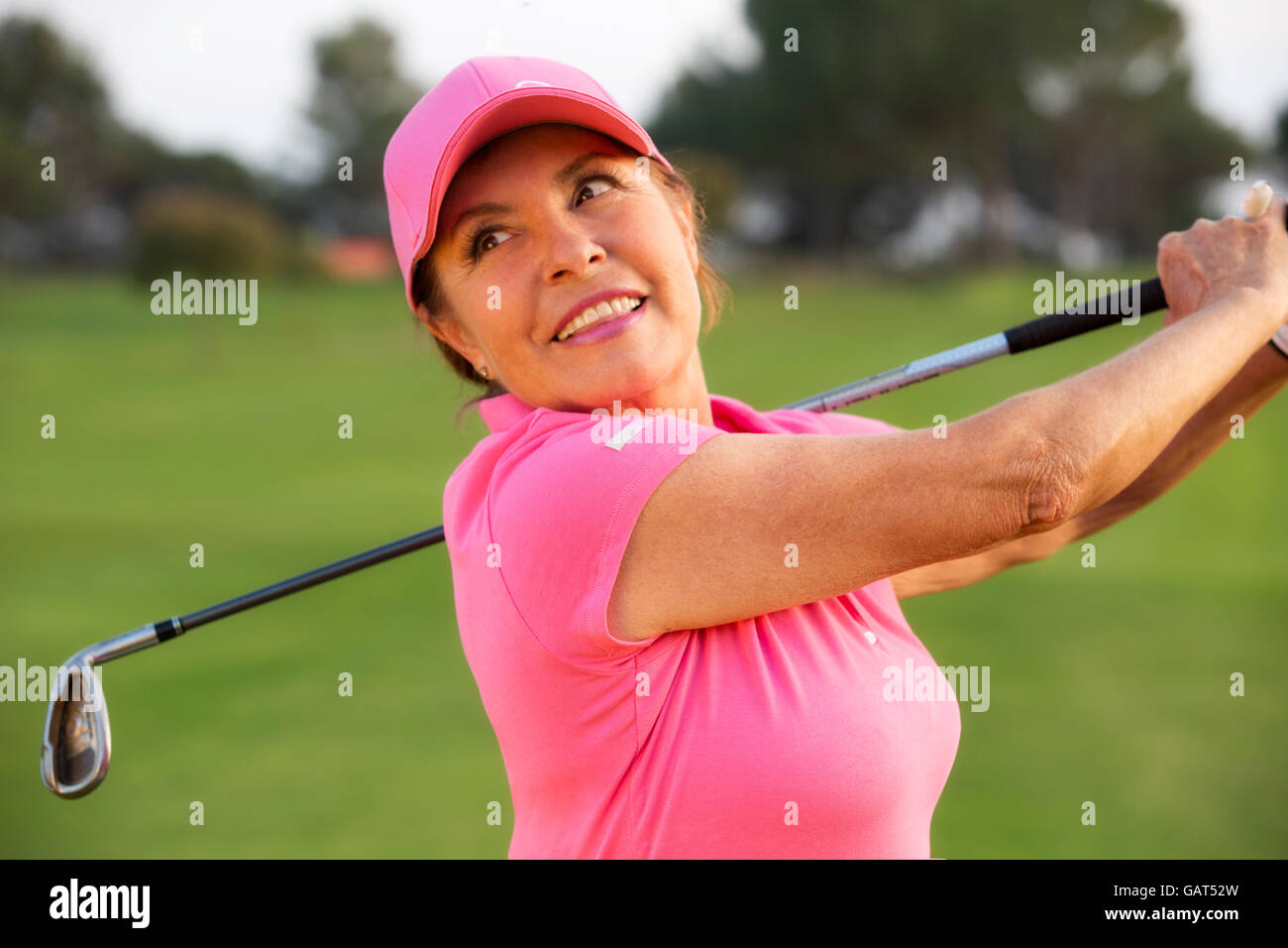 beautiful senior female golf player on a golf course Stock Photo Alamy
