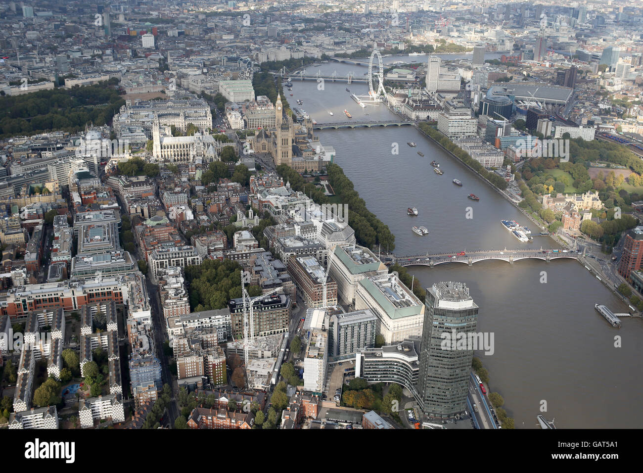 a view of london city skylinewith houses of parliment and london eye from a helicopter Stock Photo