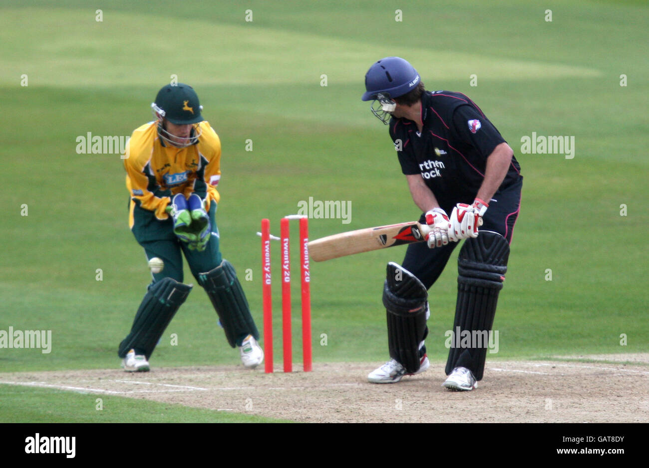 Durham Dynamos' Liam Plunkett looks behind him as the bails fall, but after initially starting to walk off believing himself to be out he stayed in when the umpire did not give him out Stock Photo