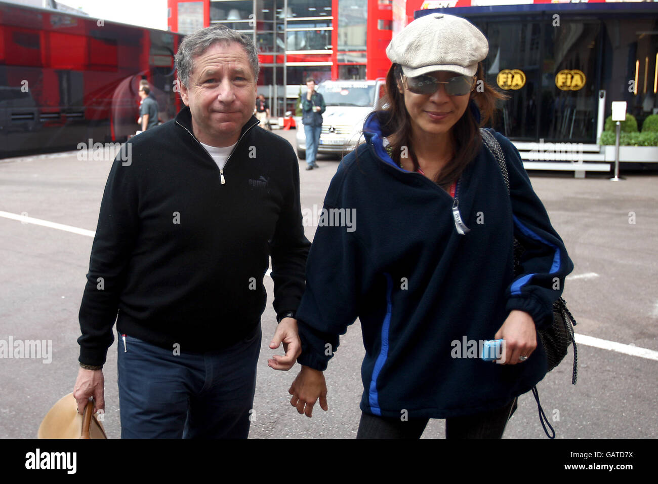 Jean Todt (l), the executive director of Scuderia Ferrari, and his girlfriend actress Michelle Yeoh walk about Monaco during the Grand Prix Weekend Stock Photo
