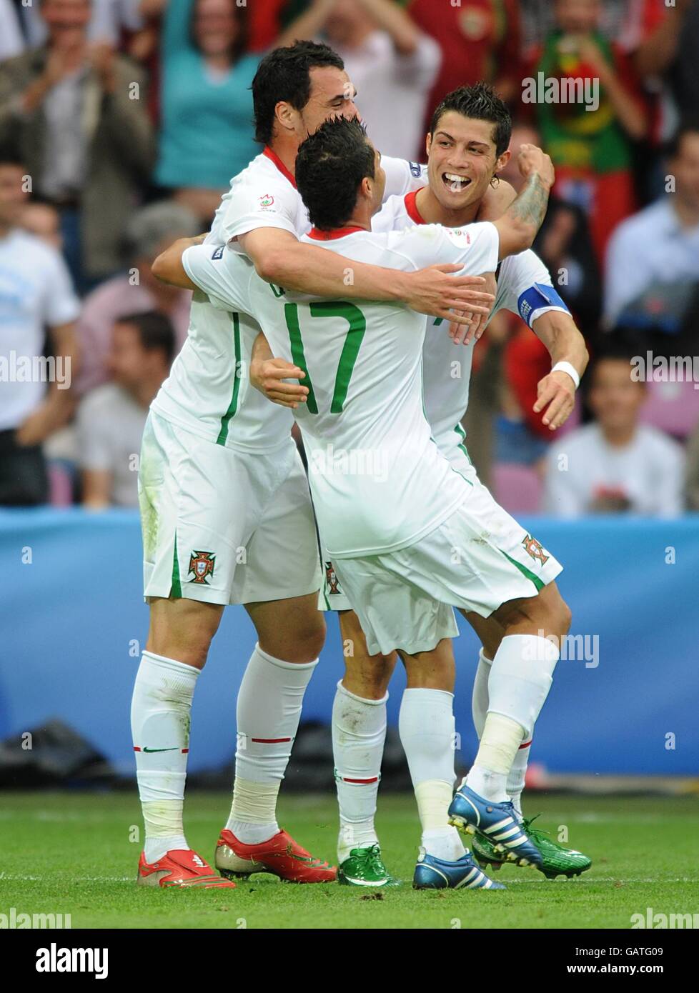 Portugal's Ricardo Quaresma (centre) celebrates with team mates Hugo Almeida (left) and Cristiano Ronaldo after scoring the fourth goal of the game. Stock Photo