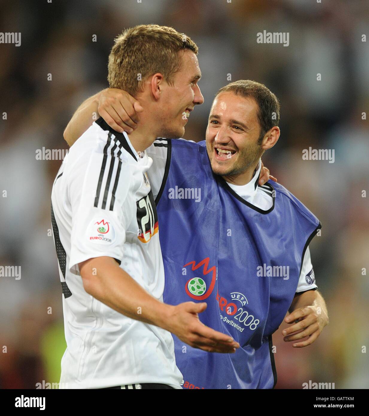 Germanys lukas podolski celebrates victory after the final whistle hi