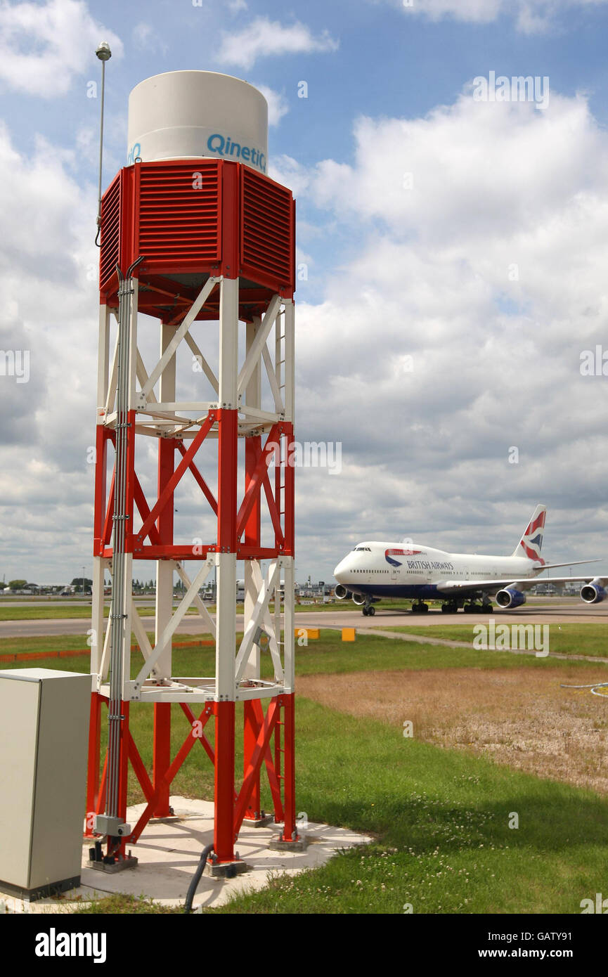 Heathrow unveils debris radar. A British Airways plane taxis past the new runway debris detection system at Heathrow Airport, London. Stock Photo
