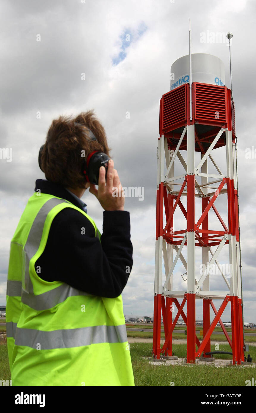 Heathrow unveils debris radar. A member of staff in front of the new runway debris detection system at Heathrow Airport, London. Stock Photo