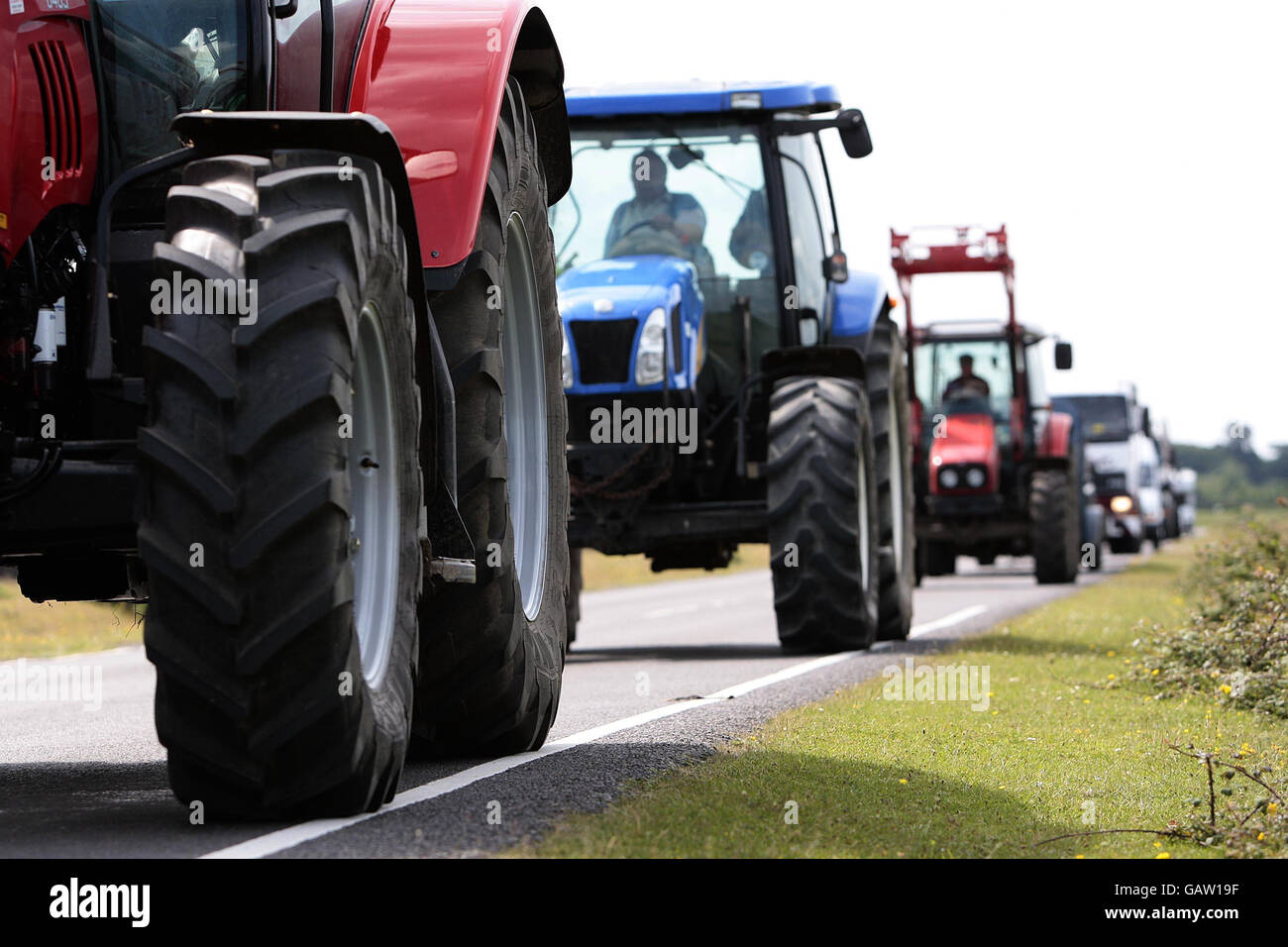 Farmers and truck drivers take part in a goslow fuel protest in the