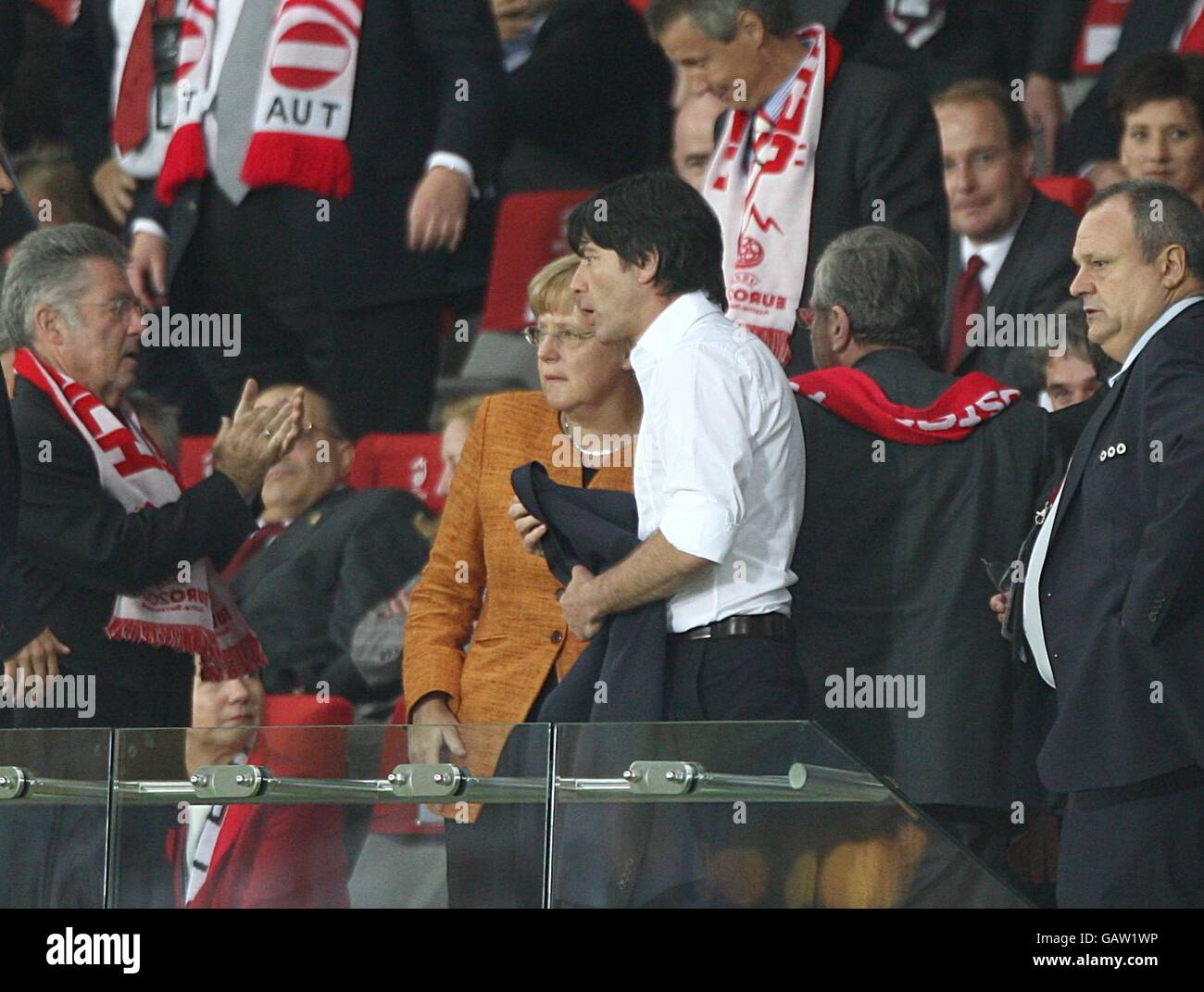 Germany's Chancellor Angela Merkel and Germany's manager Joachim Low in the stands (c) Stock Photo