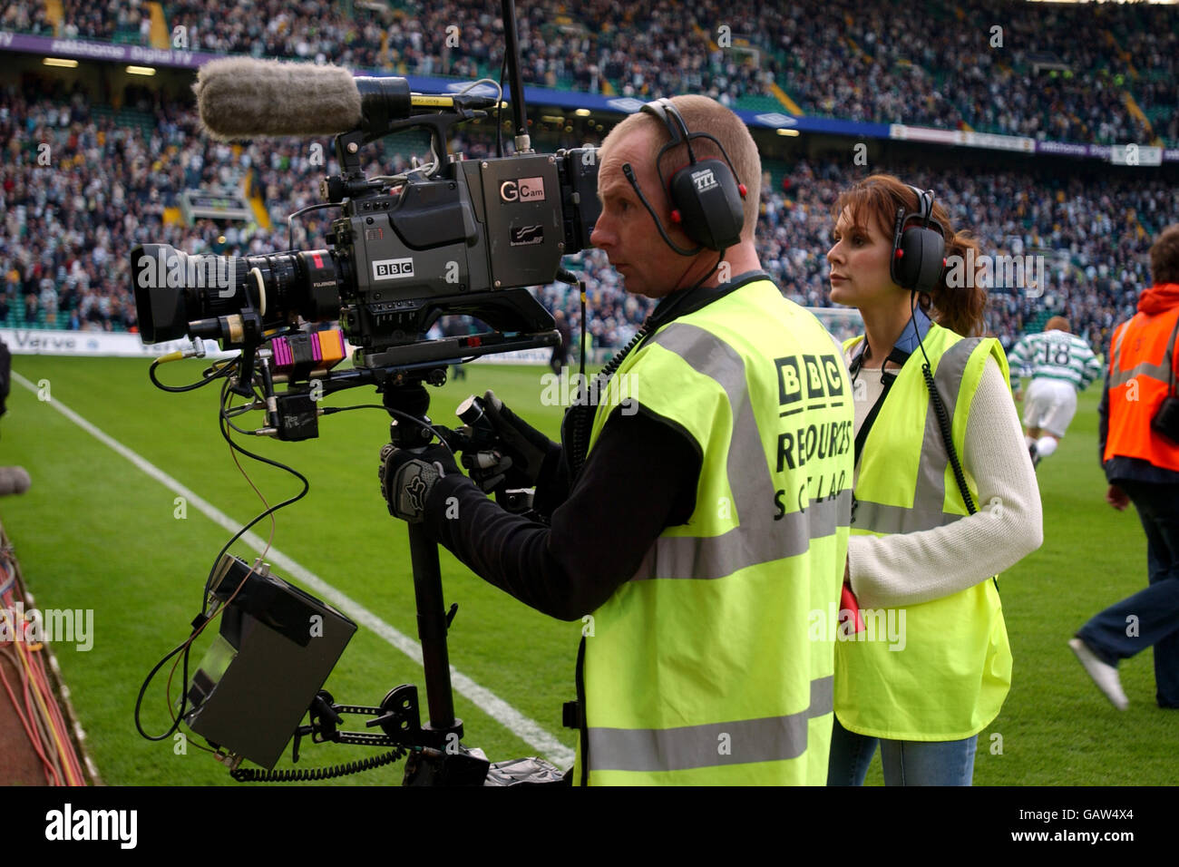 Soccer - Bank of Scotland Premier League - Celtic v Dundee. A BBC cameraman waits for the Celtic and Dundee players to emerge Stock Photo