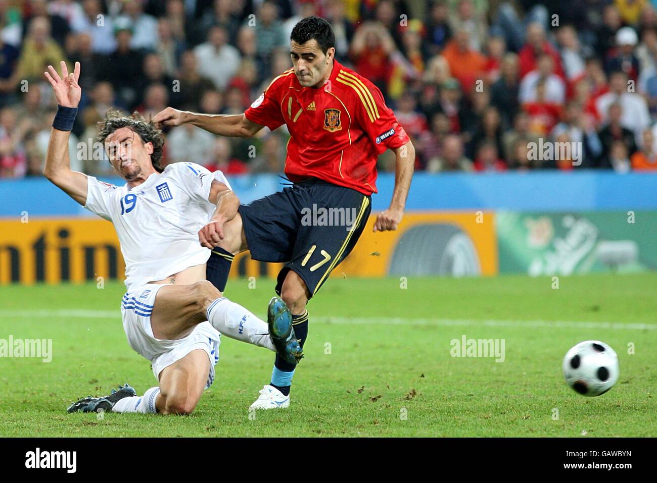 Greece's Paraskevas Antzas (l) and Spain's Daniel Guiza battle for the ball Stock Photo